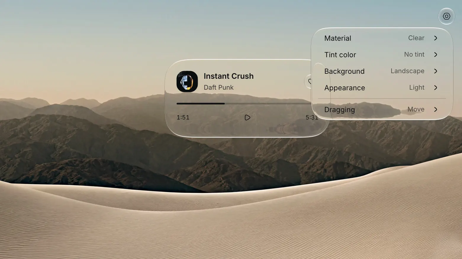 A glass music player and context menu floating over a desert landscape